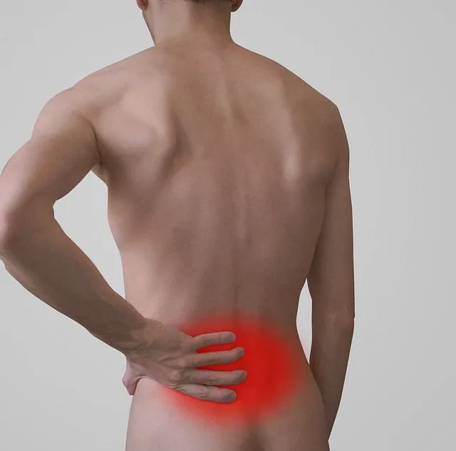 Chiropractor Marietta Georgia backache hurt man lower back pain